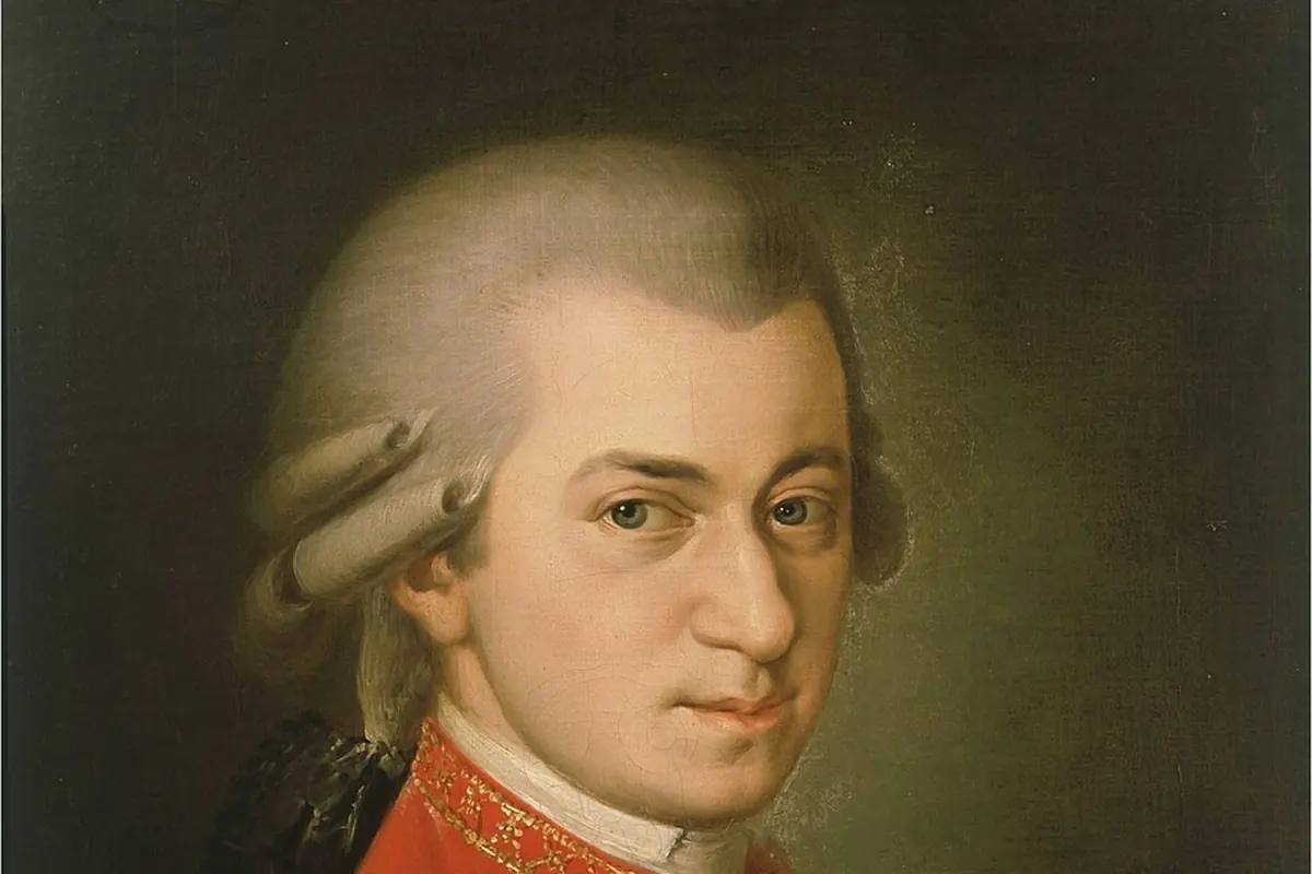 Posthumous portrait of Mozart in a red coat with a powdered wig, painted by Barbara Krafft in 1819